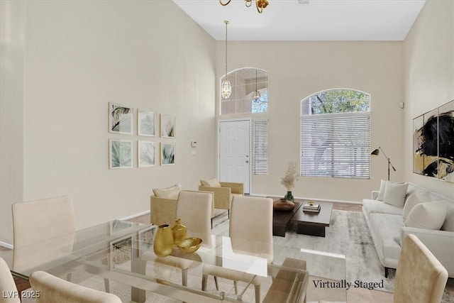 20 Staghorn St, Henderson, NV 89012 - living area with a towering ceiling and a chandelier