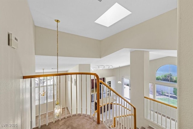 20 Staghorn St, Henderson, NV 89012 - staircase with carpet and a skylight