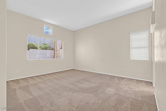 20 Staghorn St, Henderson, NV 89012 - carpeted spare room with baseboards