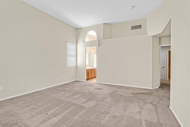 20 Staghorn St, Henderson, NV 89012 - empty room featuring light carpet and a smoke detector