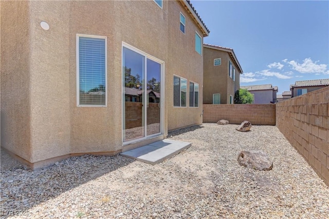 4505 Truscott Ct, Las Vegas, NV 89130 - view of property exterior featuring stucco siding and a fenced backyard