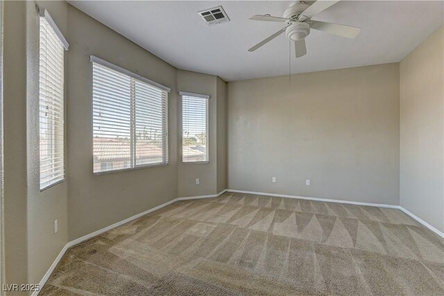4505 Truscott Ct, Las Vegas, NV 89130 - empty room featuring light colored carpet and a ceiling fan