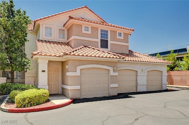 8555 W Russell Rd Unit 2015, Las Vegas, NV 89113 - view of front facade featuring stucco siding and a tile roof