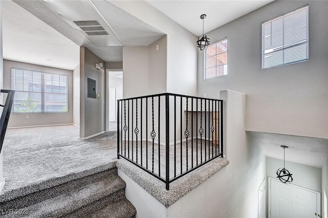 8555 W Russell Rd Unit 2015, Las Vegas, NV 89113 - stairway featuring carpet floors and electric panel