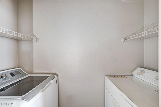 8555 W Russell Rd Unit 2015, Las Vegas, NV 89113 - laundry area featuring washing machine and clothes dryer