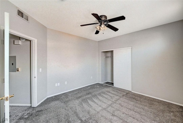 8555 W Russell Rd Unit 2015, Las Vegas, NV 89113 - unfurnished bedroom featuring carpet floors, electric panel, a closet, and a ceiling fan