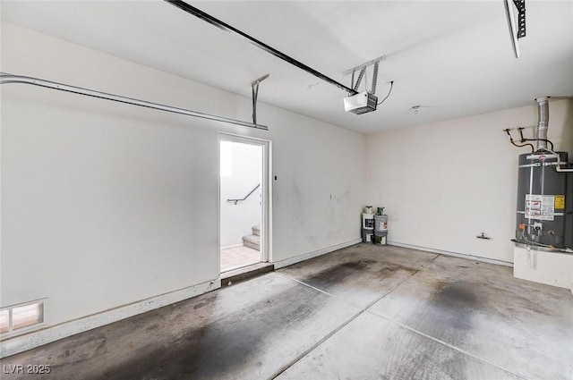 8555 W Russell Rd Unit 2015, Las Vegas, NV 89113 - garage featuring strapped water heater and a garage door opener