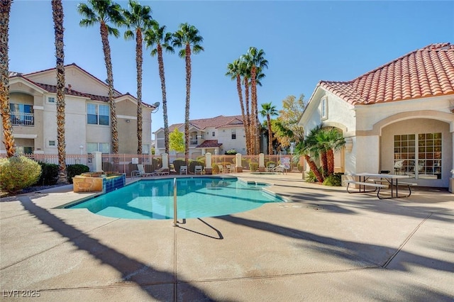8555 W Russell Rd Unit 2015, Las Vegas, NV 89113 - community pool with a patio area and a residential view