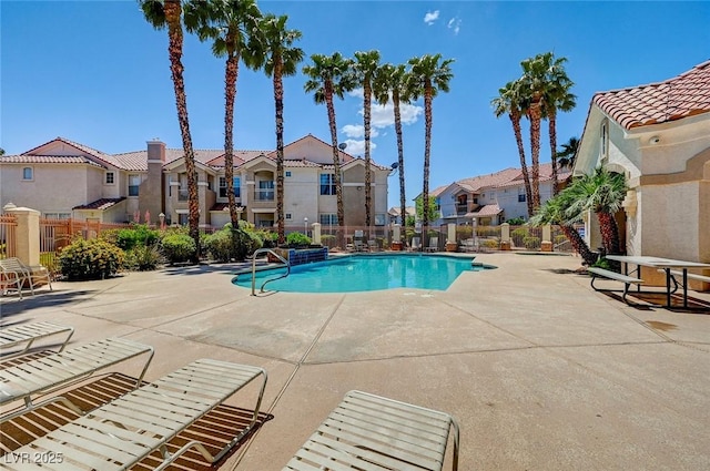 8555 W Russell Rd Unit 2015, Las Vegas, NV 89113 - community pool with a residential view and a patio