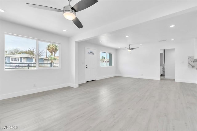 244 N 19th St, Las Vegas, NV 89101 - unfurnished living room with a ceiling fan, light wood finished floors, and recessed lighting