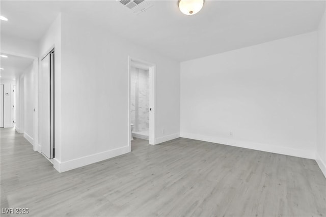 244 N 19th St, Las Vegas, NV 89101 - empty room featuring light wood-type flooring and recessed lighting
