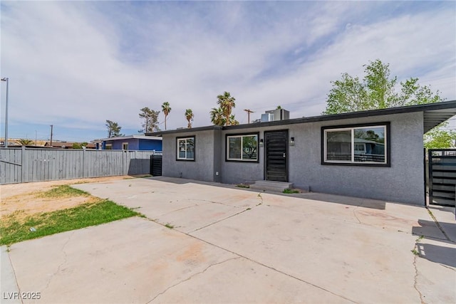 244 N 19th St, Las Vegas, NV 89101 - ranch-style home featuring stucco siding and a patio