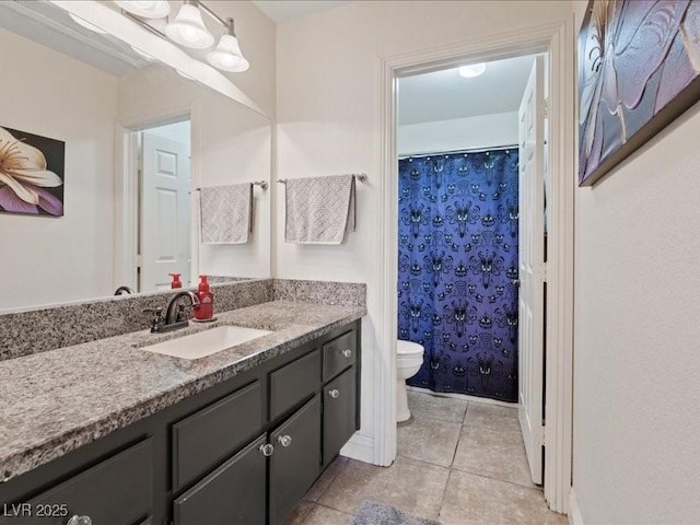 8961 Clairton Ct, Las Vegas, NV 89117 - bathroom featuring vanity and tile patterned floors
