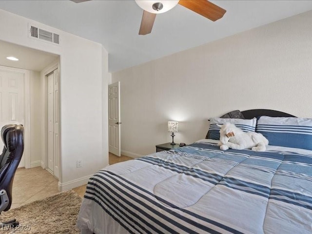 8961 Clairton Ct, Las Vegas, NV 89117 - bedroom with light tile patterned floors and ceiling fan