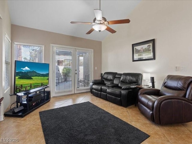 8961 Clairton Ct, Las Vegas, NV 89117 - living area with light tile patterned flooring, a ceiling fan, and lofted ceiling