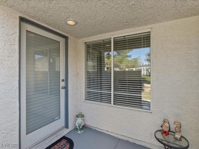 8961 Clairton Ct, Las Vegas, NV 89117 - entrance to property featuring stucco siding