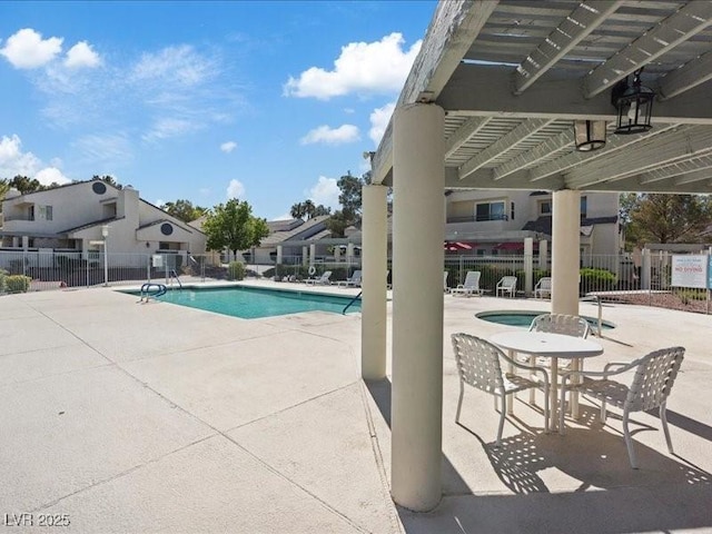8961 Clairton Ct, Las Vegas, NV 89117 - community pool with a patio area
