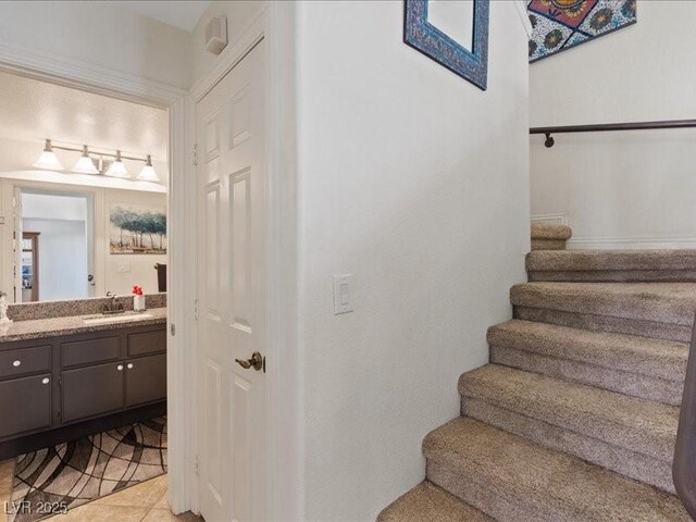 8961 Clairton Ct, Las Vegas, NV 89117 - stairs with tile patterned floors