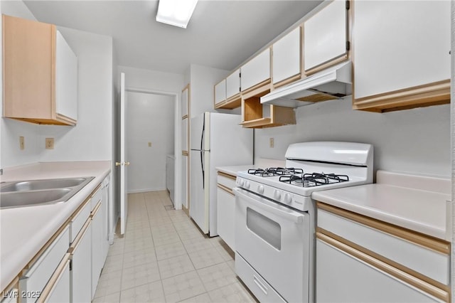 2200 S Fort Apache Rd Unit 1114, Las Vegas, NV 89117 - kitchen featuring white appliances, under cabinet range hood, and light countertops