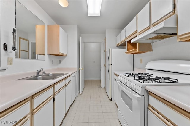 2200 S Fort Apache Rd Unit 1114, Las Vegas, NV 89117 - kitchen with white gas range oven, under cabinet range hood, light countertops, and light tile patterned flooring
