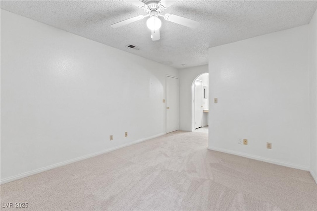 2200 S Fort Apache Rd Unit 1114, Las Vegas, NV 89117 - carpeted spare room with arched walkways, a textured ceiling, and ceiling fan