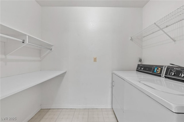 2200 S Fort Apache Rd Unit 1114, Las Vegas, NV 89117 - laundry area featuring washer and clothes dryer and baseboards