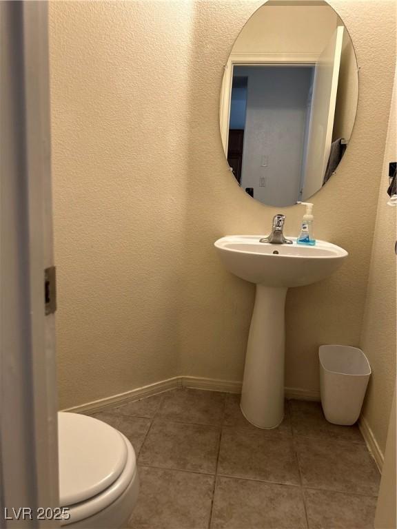 4013 Kindhearted Ct, North Las Vegas, NV 89032 - bathroom with tile patterned floors and baseboards