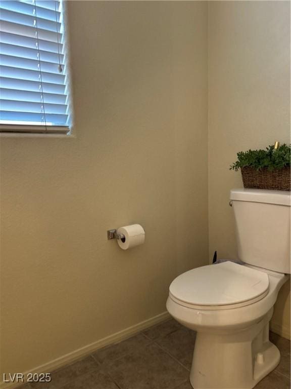 4013 Kindhearted Ct, North Las Vegas, NV 89032 - bathroom with toilet and tile patterned floors
