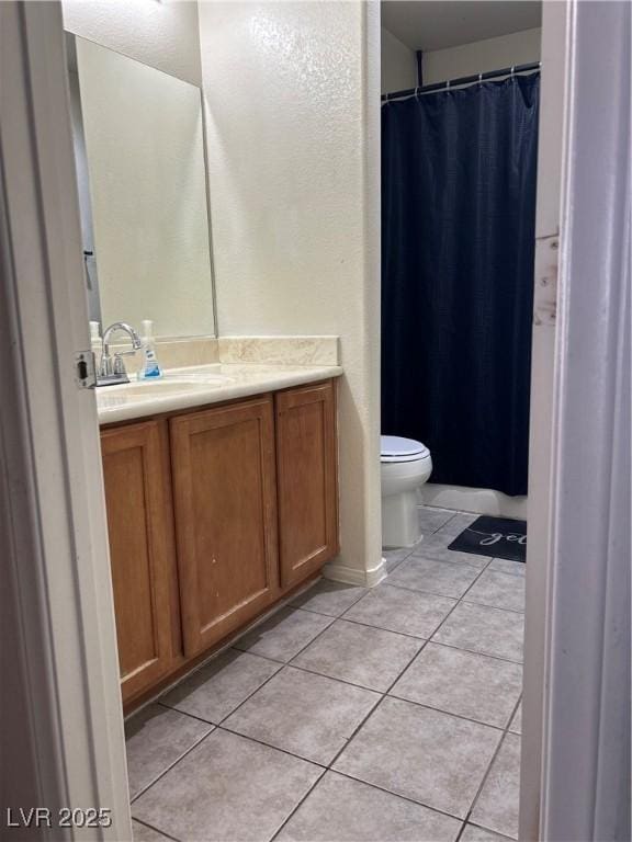 4013 Kindhearted Ct, North Las Vegas, NV 89032 - full bath featuring tile patterned flooring, vanity, and curtained shower