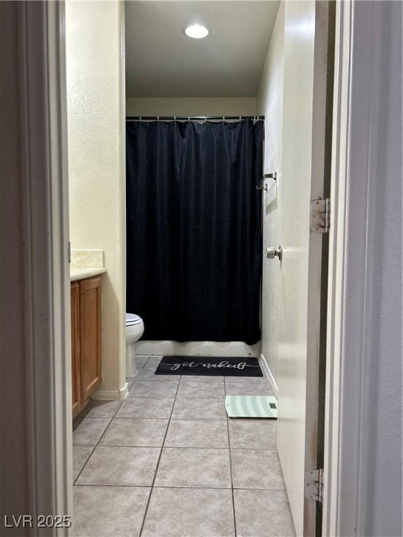 4013 Kindhearted Ct, North Las Vegas, NV 89032 - bathroom with vanity, tile patterned flooring, and a shower with shower curtain