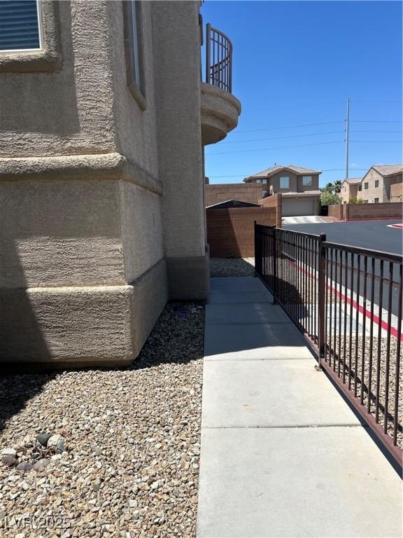 4013 Kindhearted Ct, North Las Vegas, NV 89032 - view of side of home featuring a balcony