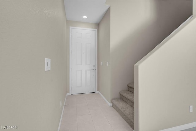 7104 Stockton Dunes St, North Las Vegas, NV 89084 - doorway featuring light tile patterned flooring, stairway, and recessed lighting