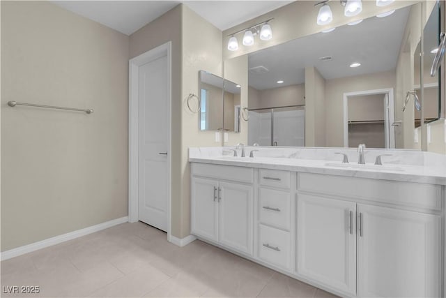 7104 Stockton Dunes St, North Las Vegas, NV 89084 - full bath featuring double vanity, a stall shower, and tile patterned flooring