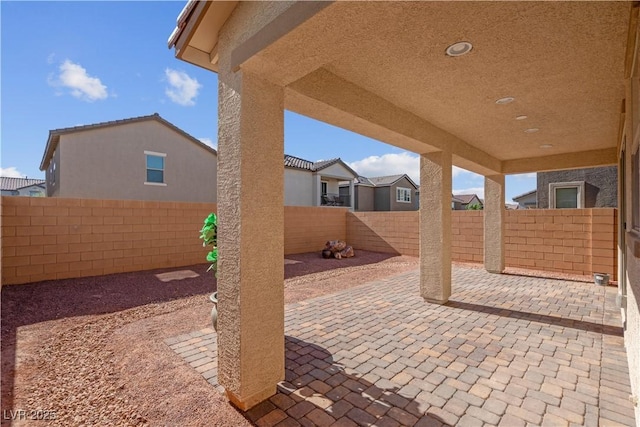 7104 Stockton Dunes St, North Las Vegas, NV 89084 - fenced backyard featuring a patio