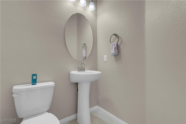 7104 Stockton Dunes St, North Las Vegas, NV 89084 - bathroom with toilet and baseboards