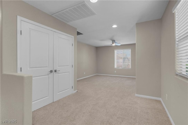 7104 Stockton Dunes St, North Las Vegas, NV 89084 - unfurnished bedroom featuring light colored carpet, recessed lighting, and a closet