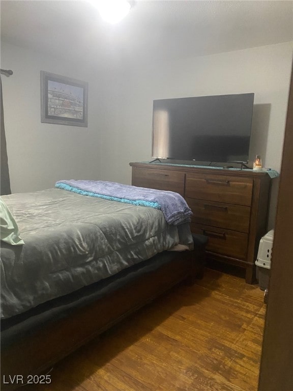 27 Carson Ct, Ely, NV 89301 - bedroom featuring dark wood-style floors