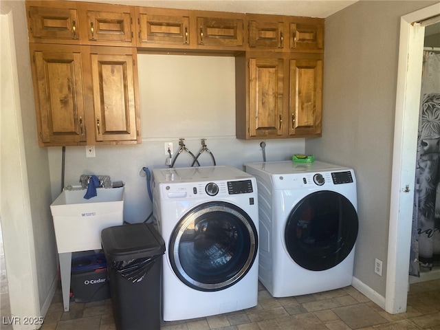 27 Carson Ct, Ely, NV 89301 - laundry area with cabinet space and washer and dryer