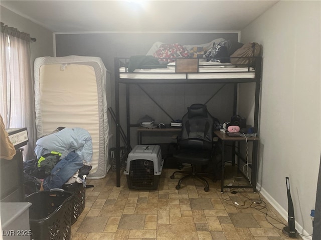 27 Carson Ct, Ely, NV 89301 - bedroom featuring stone finish floors and an office area