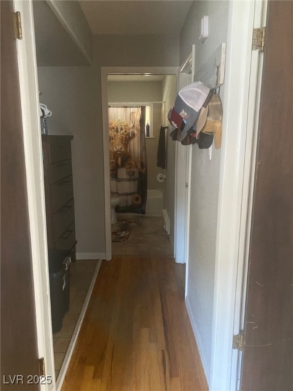 27 Carson Ct, Ely, NV 89301 - hall featuring wood finished floors and baseboards