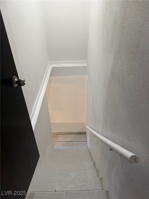 27 Carson Ct, Ely, NV 89301 - stairway with a textured wall