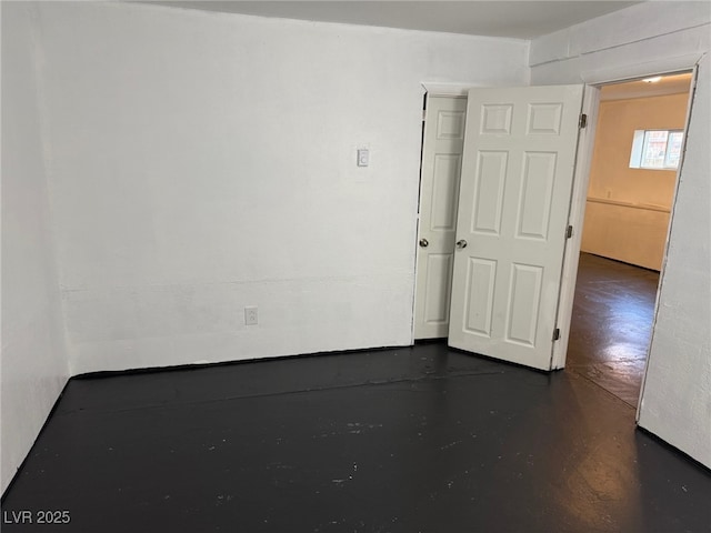 27 Carson Ct, Ely, NV 89301 - spare room with finished concrete floors