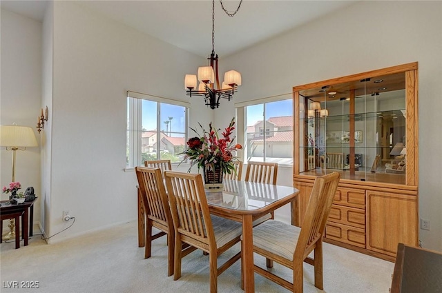 1734 Marshall Dr, Henderson, NV 89014 - dining area featuring a chandelier and light carpet
