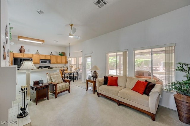 1734 Marshall Dr, Henderson, NV 89014 - living area with light carpet and ceiling fan