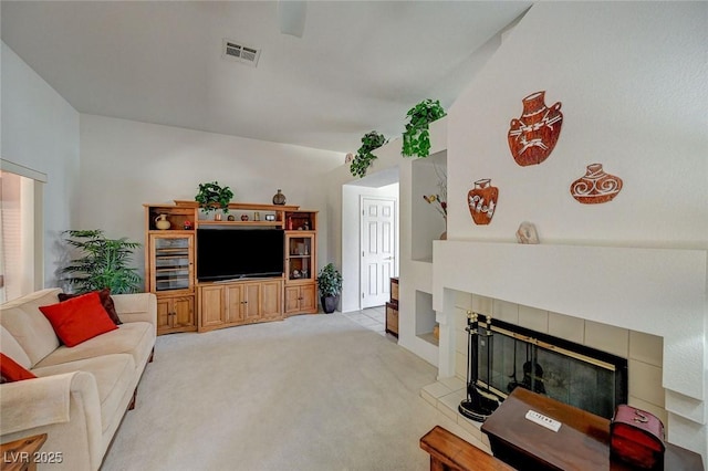1734 Marshall Dr, Henderson, NV 89014 - living area featuring a tiled fireplace and light carpet