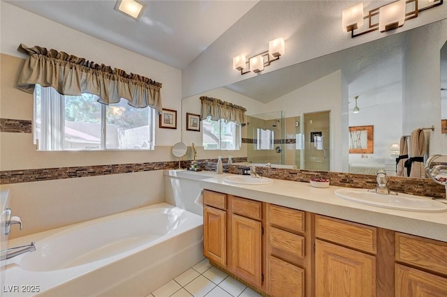 1734 Marshall Dr, Henderson, NV 89014 - full bath with vaulted ceiling, a garden tub, a shower stall, tile patterned flooring, and double vanity