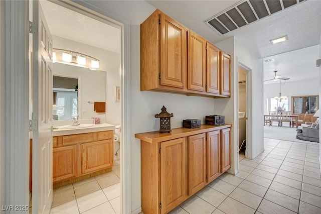 1734 Marshall Dr, Henderson, NV 89014 - hall with light tile patterned floors and healthy amount of natural light