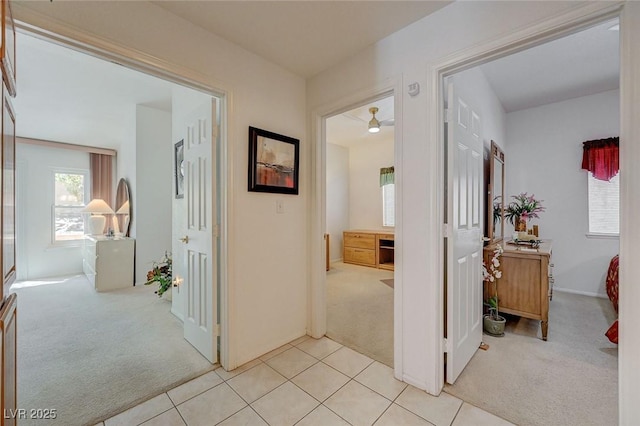 1734 Marshall Dr, Henderson, NV 89014 - corridor featuring light carpet and light tile patterned floors