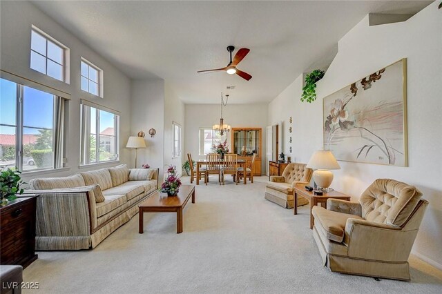 1734 Marshall Dr, Henderson, NV 89014 - living room with carpet floors, ceiling fan, and a chandelier