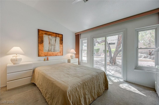 1734 Marshall Dr, Henderson, NV 89014 - bedroom featuring access to outside, light carpet, multiple windows, and lofted ceiling